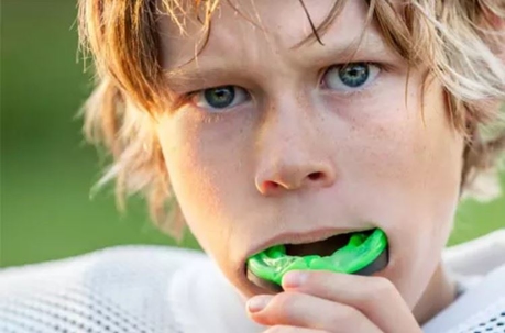 boy with mouth guard