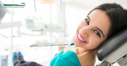 woman in dental chair smiling